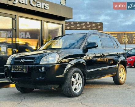 Чорний Хендай Туксон, об'ємом двигуна 2 л та пробігом 186 тис. км за 8300 $, фото 5 на Automoto.ua