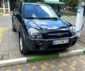Черный Хендай Туксон, объемом двигателя 2 л и пробегом 151 тыс. км за 9000 $, фото 1 на Automoto.ua