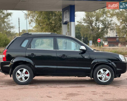 Черный Хендай Туксон, объемом двигателя 2 л и пробегом 361 тыс. км за 6499 $, фото 6 на Automoto.ua