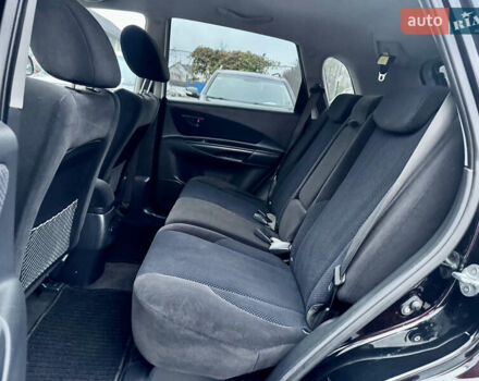 Черный Хендай Туксон, объемом двигателя 1.98 л и пробегом 96 тыс. км за 9900 $, фото 8 на Automoto.ua