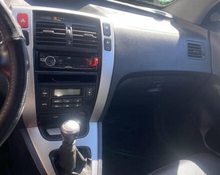 Чорний Хендай Туксон, об'ємом двигуна 1.99 л та пробігом 230 тис. км за 8000 $, фото 12 на Automoto.ua