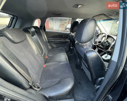 Чорний Хендай Туксон, об'ємом двигуна 2 л та пробігом 240 тис. км за 8500 $, фото 16 на Automoto.ua