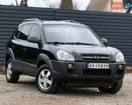 Черный Хендай Туксон, объемом двигателя 2 л и пробегом 252 тыс. км за 7200 $, фото 8 на Automoto.ua