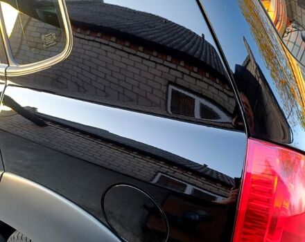 Черный Хендай Туксон, объемом двигателя 2 л и пробегом 261 тыс. км за 8900 $, фото 3 на Automoto.ua