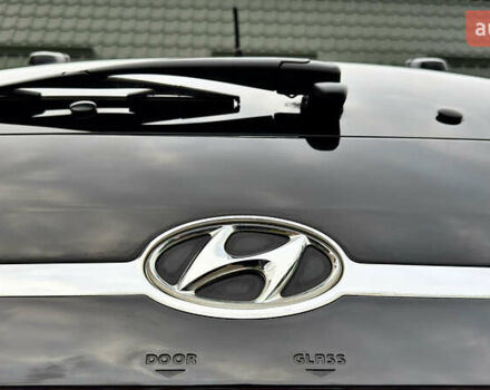 Чорний Хендай Туксон, об'ємом двигуна 2 л та пробігом 182 тис. км за 8299 $, фото 26 на Automoto.ua