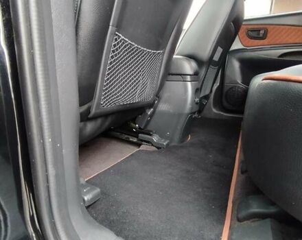 Черный Хендай Туксон, объемом двигателя 1.98 л и пробегом 214 тыс. км за 7700 $, фото 20 на Automoto.ua