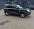 Черный Хендай Туксон, объемом двигателя 2 л и пробегом 255 тыс. км за 8700 $, фото 2 на Automoto.ua