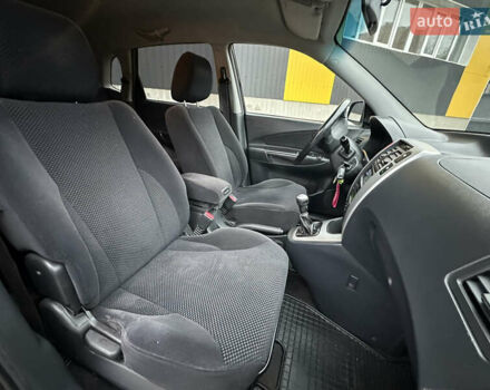 Чорний Хендай Туксон, об'ємом двигуна 2 л та пробігом 243 тис. км за 7999 $, фото 29 на Automoto.ua