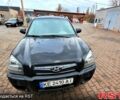Черный Хендай Туксон, объемом двигателя 2 л и пробегом 223 тыс. км за 7500 $, фото 9 на Automoto.ua