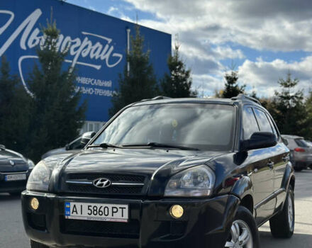 Черный Хендай Туксон, объемом двигателя 2 л и пробегом 300 тыс. км за 8300 $, фото 2 на Automoto.ua