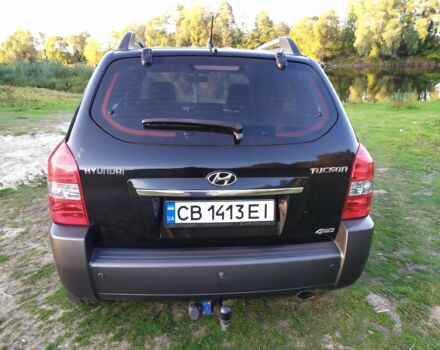 Черный Хендай Туксон, объемом двигателя 2 л и пробегом 162 тыс. км за 8500 $, фото 10 на Automoto.ua