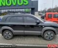 Чорний Хендай Туксон, об'ємом двигуна 2 л та пробігом 106 тис. км за 8350 $, фото 1 на Automoto.ua