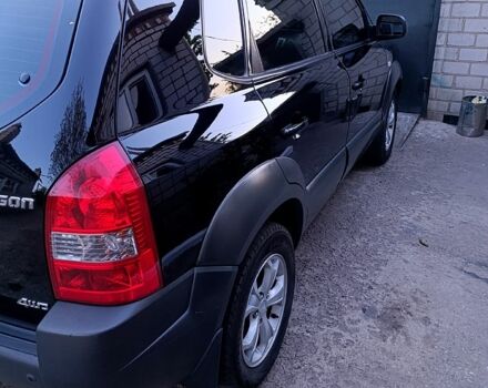 Черный Хендай Туксон, объемом двигателя 2 л и пробегом 261 тыс. км за 8900 $, фото 11 на Automoto.ua