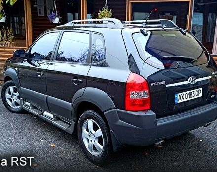 Чорний Хендай Туксон, об'ємом двигуна 2 л та пробігом 188 тис. км за 8800 $, фото 2 на Automoto.ua