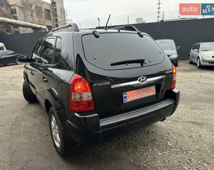 Чорний Хендай Туксон, об'ємом двигуна 2 л та пробігом 243 тис. км за 7999 $, фото 13 на Automoto.ua