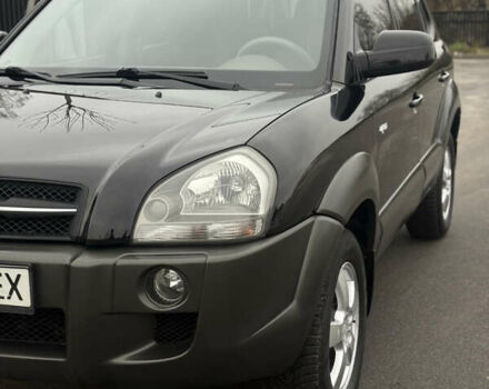 Чорний Хендай Туксон, об'ємом двигуна 2 л та пробігом 107 тис. км за 8500 $, фото 4 на Automoto.ua