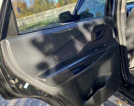 Черный Хендай Туксон, объемом двигателя 1.98 л и пробегом 218 тыс. км за 7200 $, фото 15 на Automoto.ua