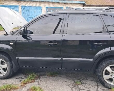 Черный Хендай Туксон, объемом двигателя 2 л и пробегом 270 тыс. км за 8300 $, фото 1 на Automoto.ua