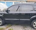 Черный Хендай Туксон, объемом двигателя 2 л и пробегом 270 тыс. км за 8300 $, фото 1 на Automoto.ua