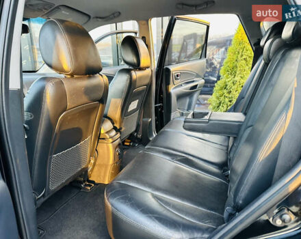 Чорний Хендай Туксон, об'ємом двигуна 2 л та пробігом 186 тис. км за 8300 $, фото 15 на Automoto.ua