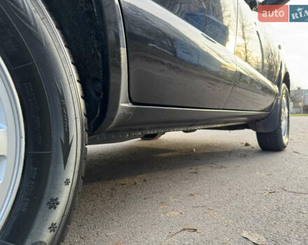 Черный Хендай Туксон, объемом двигателя 1.98 л и пробегом 196 тыс. км за 7999 $, фото 21 на Automoto.ua