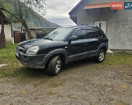Черный Хендай Туксон, объемом двигателя 1.98 л и пробегом 220 тыс. км за 8300 $, фото 1 на Automoto.ua