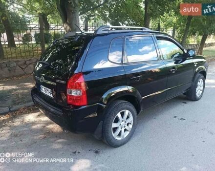 Чорний Хендай Туксон, об'ємом двигуна 1.98 л та пробігом 230 тис. км за 6950 $, фото 8 на Automoto.ua