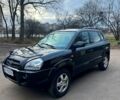 Черный Хендай Туксон, объемом двигателя 2 л и пробегом 215 тыс. км за 6700 $, фото 1 на Automoto.ua