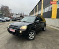 Чорний Хендай Туксон, об'ємом двигуна 2 л та пробігом 243 тис. км за 7999 $, фото 2 на Automoto.ua