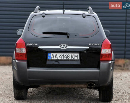 Черный Хендай Туксон, объемом двигателя 2 л и пробегом 252 тыс. км за 7200 $, фото 7 на Automoto.ua