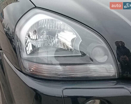 Черный Хендай Туксон, объемом двигателя 2 л и пробегом 192 тыс. км за 7990 $, фото 3 на Automoto.ua