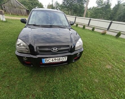 Черный Хендай Туксон, объемом двигателя 2 л и пробегом 220 тыс. км за 8200 $, фото 2 на Automoto.ua