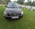 Черный Хендай Туксон, объемом двигателя 2 л и пробегом 220 тыс. км за 8200 $, фото 2 на Automoto.ua