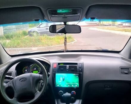 Черный Хендай Туксон, объемом двигателя 2 л и пробегом 152 тыс. км за 7800 $, фото 8 на Automoto.ua