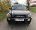 Чорний Хендай Туксон, об'ємом двигуна 1.98 л та пробігом 220 тис. км за 8000 $, фото 1 на Automoto.ua