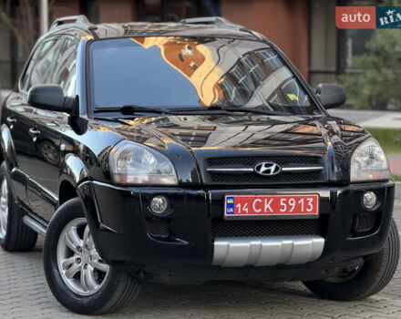 Чорний Хендай Туксон, об'ємом двигуна 2 л та пробігом 156 тис. км за 7850 $, фото 12 на Automoto.ua
