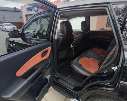 Черный Хендай Туксон, объемом двигателя 1.98 л и пробегом 214 тыс. км за 7700 $, фото 14 на Automoto.ua