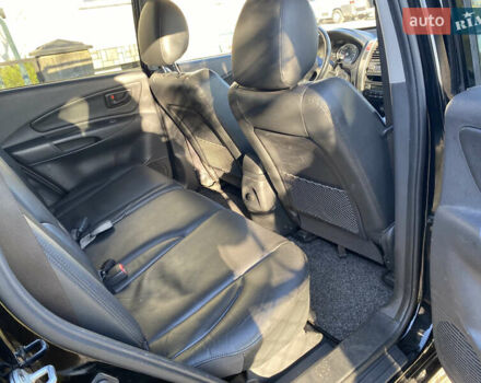 Черный Хендай Туксон, объемом двигателя 2 л и пробегом 149 тыс. км за 8250 $, фото 7 на Automoto.ua