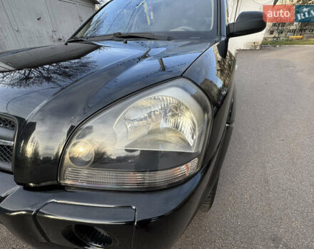 Черный Хендай Туксон, объемом двигателя 1.98 л и пробегом 196 тыс. км за 7999 $, фото 12 на Automoto.ua