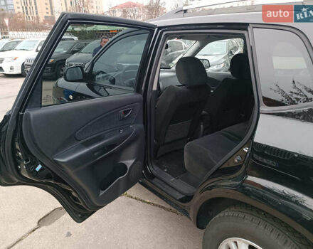 Черный Хендай Туксон, объемом двигателя 2 л и пробегом 192 тыс. км за 7990 $, фото 12 на Automoto.ua