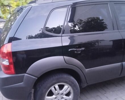 Черный Хендай Туксон, объемом двигателя 2 л и пробегом 209 тыс. км за 8200 $, фото 6 на Automoto.ua