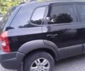 Черный Хендай Туксон, объемом двигателя 2 л и пробегом 209 тыс. км за 8200 $, фото 6 на Automoto.ua