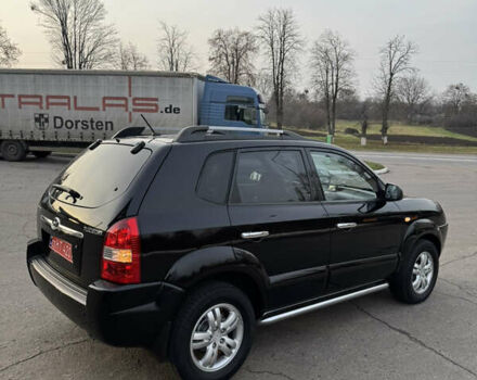 Черный Хендай Туксон, объемом двигателя 2 л и пробегом 210 тыс. км за 7850 $, фото 16 на Automoto.ua