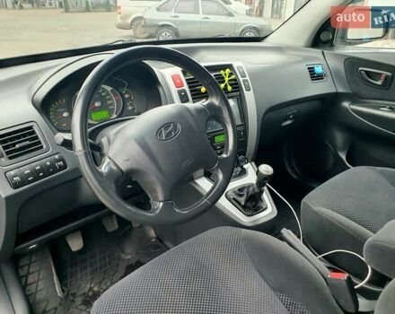 Чорний Хендай Туксон, об'ємом двигуна 2 л та пробігом 225 тис. км за 8000 $, фото 42 на Automoto.ua