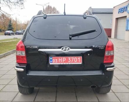 Черный Хендай Туксон, объемом двигателя 1.98 л и пробегом 214 тыс. км за 7700 $, фото 4 на Automoto.ua