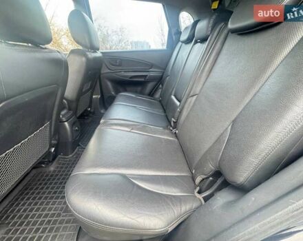 Черный Хендай Туксон, объемом двигателя 2 л и пробегом 148 тыс. км за 9500 $, фото 12 на Automoto.ua