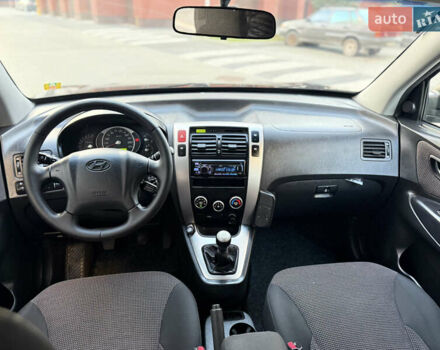 Чорний Хендай Туксон, об'ємом двигуна 2 л та пробігом 156 тис. км за 7850 $, фото 24 на Automoto.ua