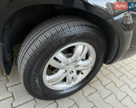 Чорний Хендай Туксон, об'ємом двигуна 2 л та пробігом 156 тис. км за 7850 $, фото 41 на Automoto.ua