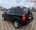 Черный Хендай Туксон, объемом двигателя 2 л и пробегом 209 тыс. км за 7999 $, фото 3 на Automoto.ua