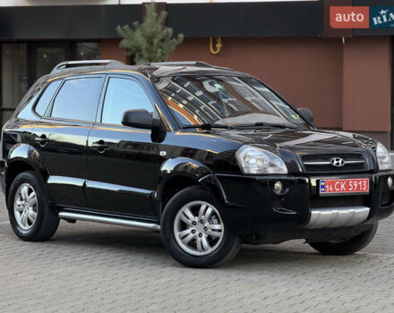Чорний Хендай Туксон, об'ємом двигуна 2 л та пробігом 156 тис. км за 7850 $, фото 11 на Automoto.ua